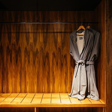 Macq 01 Hotel Hobart Eksteriør bilde A bathrobe hanging on a wooden bench